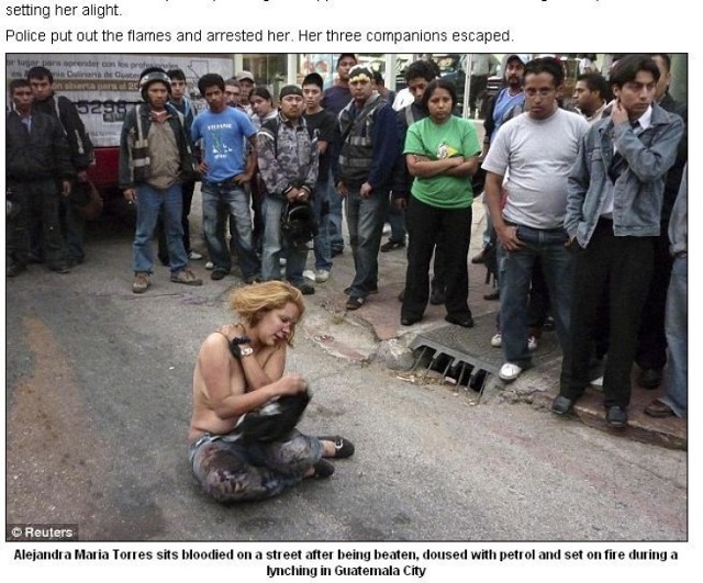 http://www.dailymail.co.uk/news/worldnews/article-1236323/Female-armed-robber-stripped-beaten-set-alight-lynch-mob.html