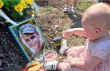 Wojna na Ukrainie. Dziewczynka odwiedziła grób ojca w dniu swoich urodzin. "Zjadła z nim śniadanie" 