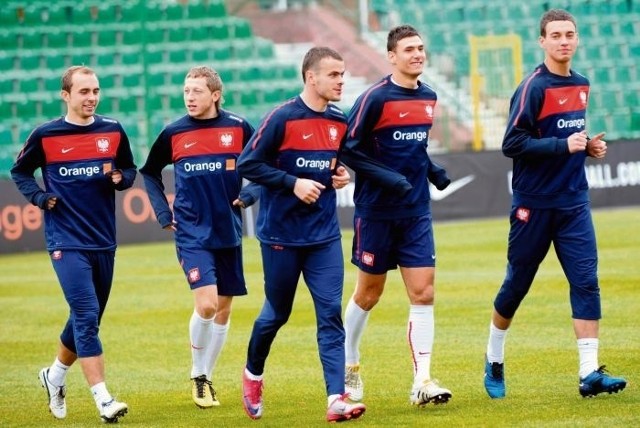 Adrian Mierzejewski, Rafał Murawski, Paweł Brożek, Grzegorz Wojtkowiak i Maciej Sadlok podczas treningu
