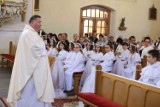 Uroczystość pierwszokomunijna w parafii św. Krzyża w Lesznie [ZDJĘCIA]