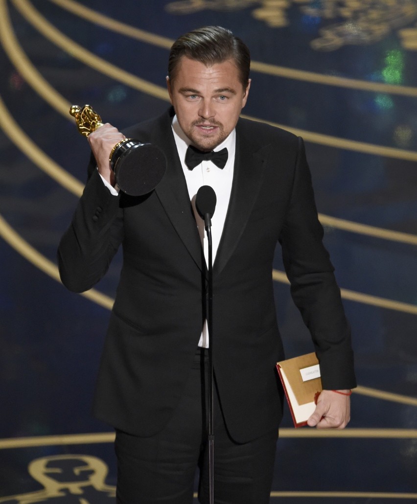 Leonardo dicaprio accepts the award for best actor in a...