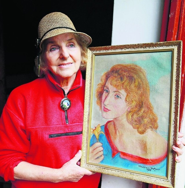 Krystyna Trylańska ze swym portretem, pędzla Wlastimila Hofmana