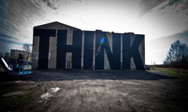 Mural "Think" powstał w 2013 roku w ramach Katowice Street Art Festival. Znajduje się w Szopienicach. Jego autorem jest hiszpański artysta Spy.