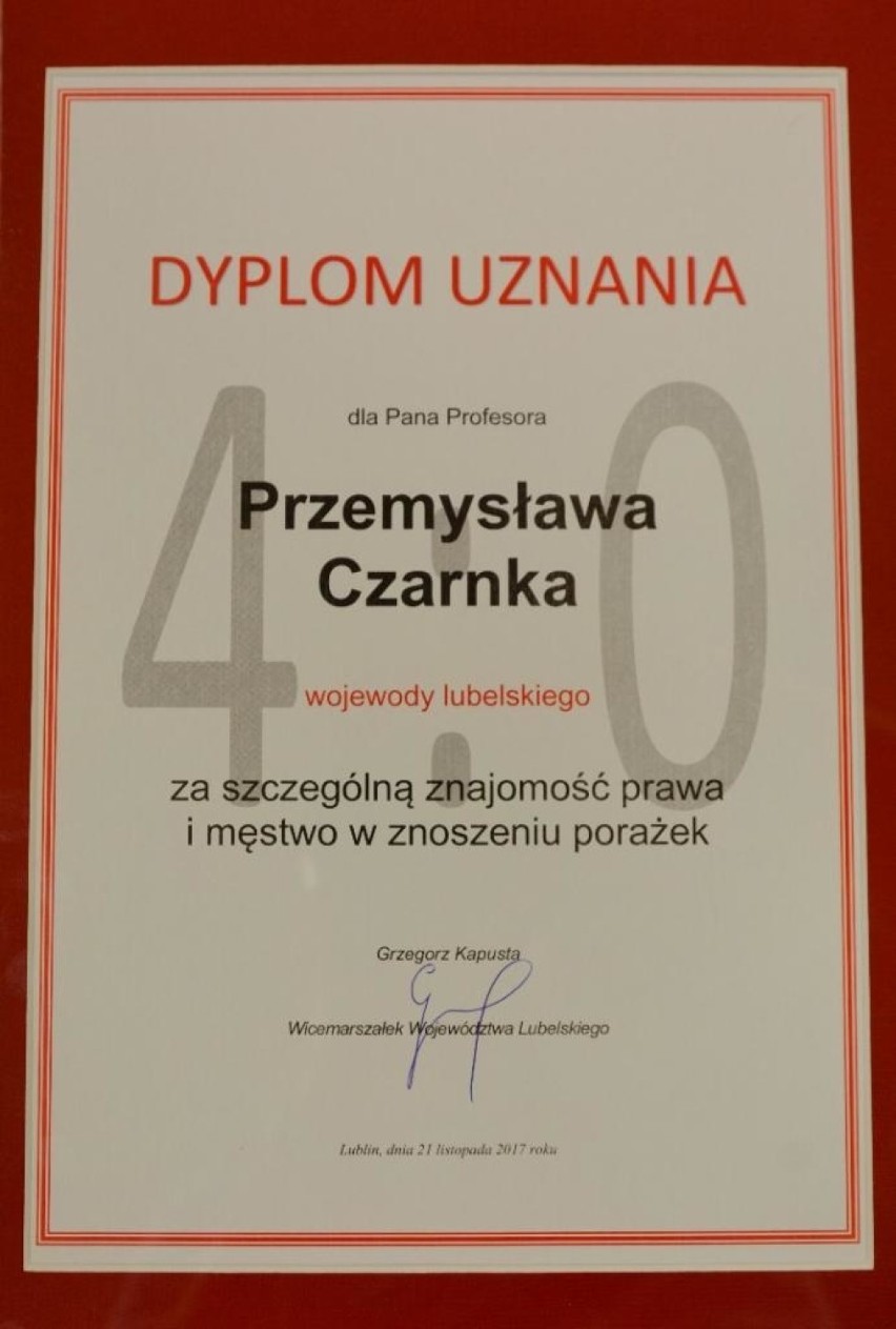 dyplom za szczególną znajomość prawa i męstwo w znoszeniu...