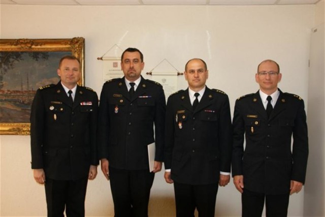 St. bryg. Adam Konieczny, mł. kpt. Grzegorz Fleszar, st. kpt. Artur Czułajewski, bryg. Łukasz Winkowski