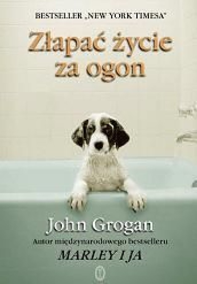 Okładka książki &quot;Złapać życie za ogon&quot; John Grogan