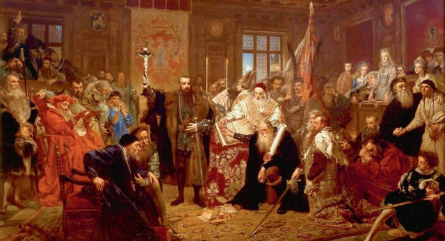 Obraz „Unia Lubelska” Jana Matejki. Stanisław Hozjusz wzniesionymi rękoma błogosławi idei (po lewej stronie)