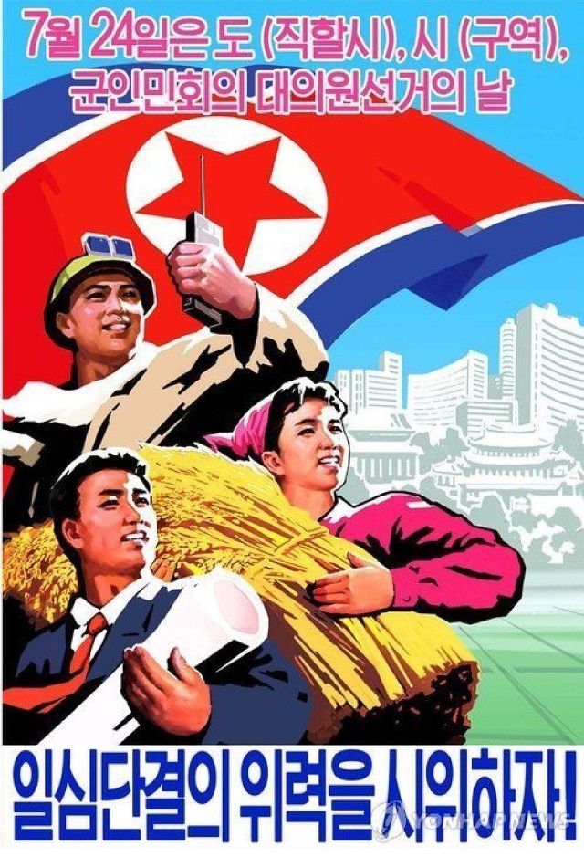 Północnokoreański plakat zachęcający do udziału w lipcowych wyborach samorządowych.