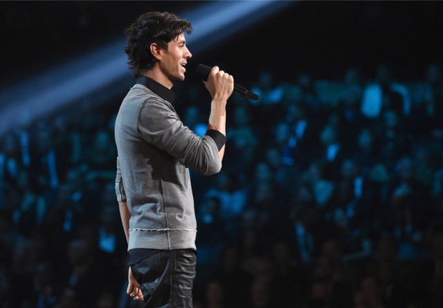 Enrique iglesias presents the award for song of the year at the 57th annual grammy awards on sunday, feb. 8, 2015, in los angeles. (photo by john shearer/invision/ap)