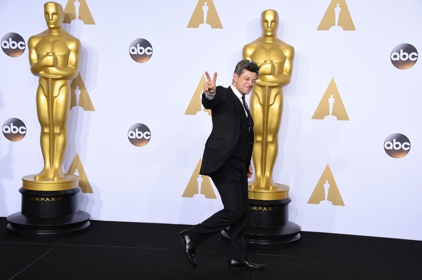 Andy serkis poses in the press room at the oscars on sunday,...