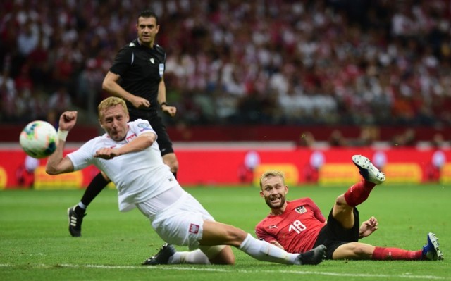 Polska zremisowała z Austrią 0:0 w szóstej kolejce eliminacji mistrzostw Europy 2020. Zobacz zdjęcia z rywalizacji na PGE Narodowym w Warszawie i jak na trybunach bawili się kibice.
